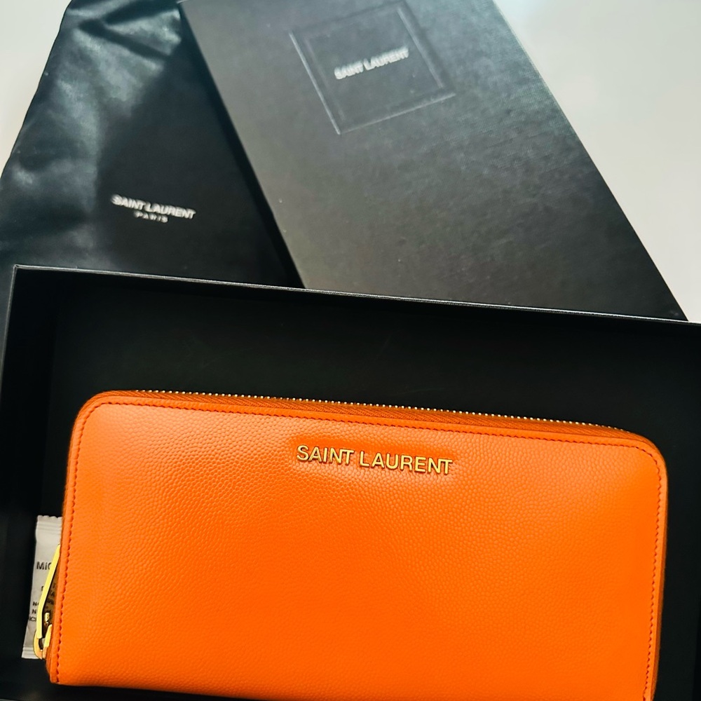 Saint Laurent Orange Leather Wallet brand new with dustbag and box. Authentic